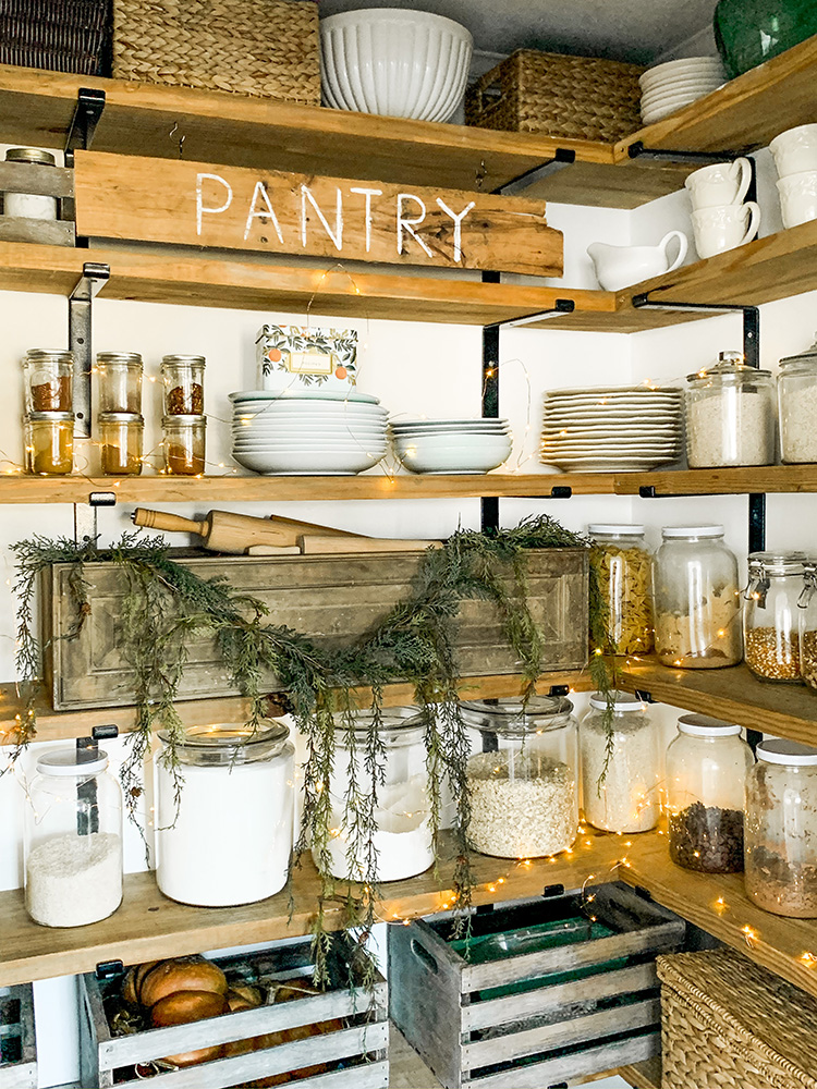 Walk In Butler's Pantry Decorated for Christmas With Garland And Copper Twinkle Lights